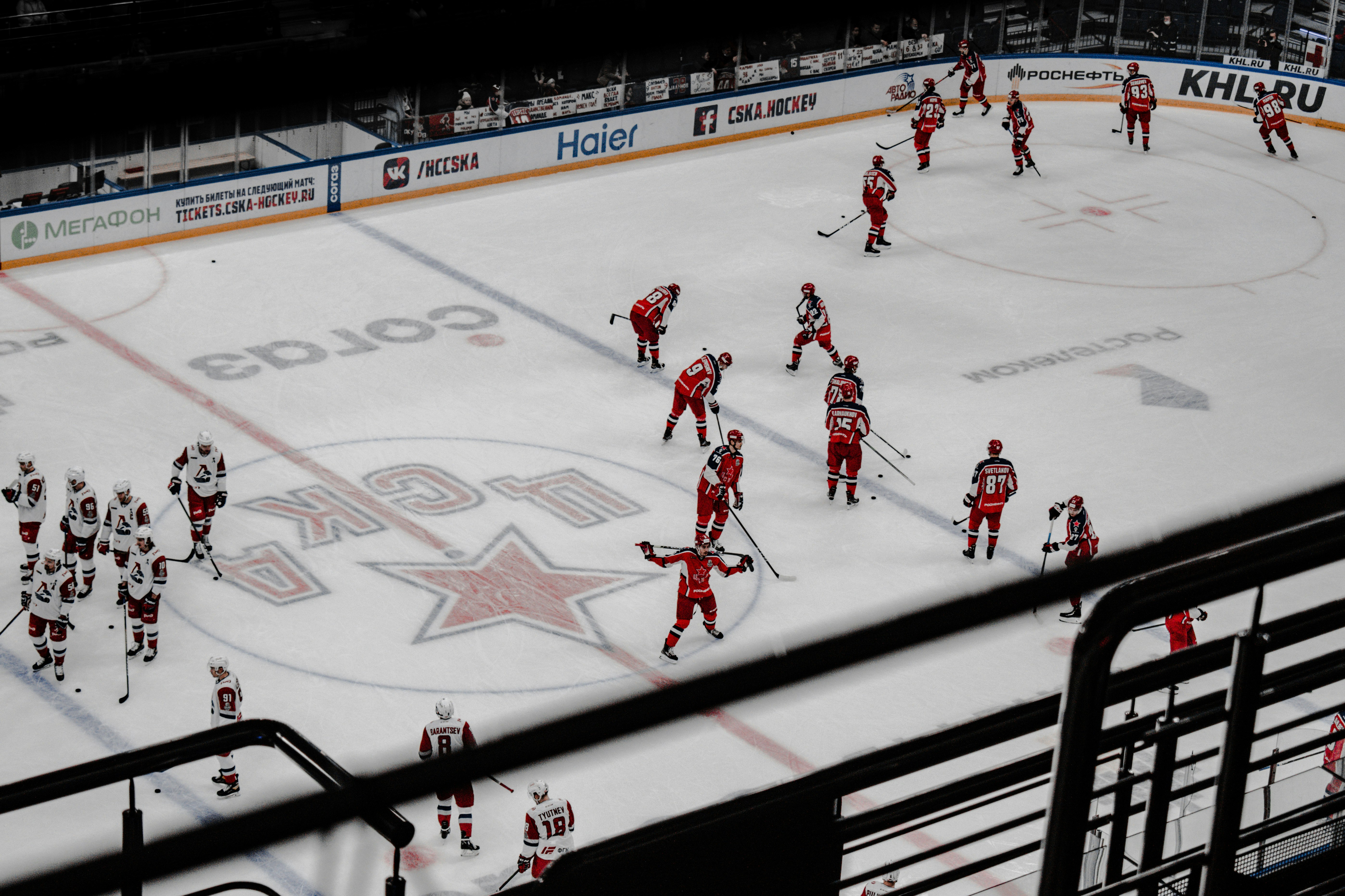 people playing ice hockey game